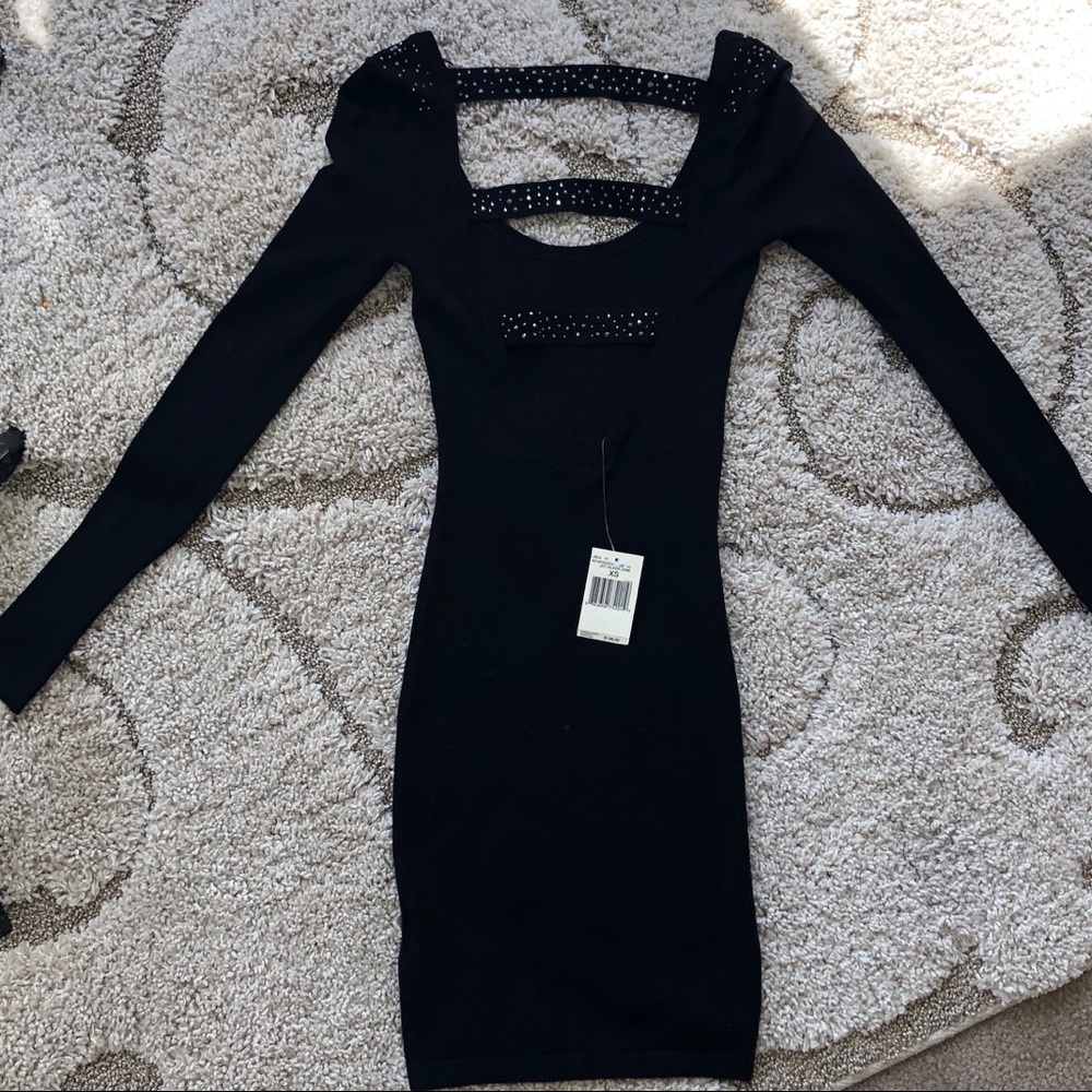 Gorgeous black cutout dress with stud detail
